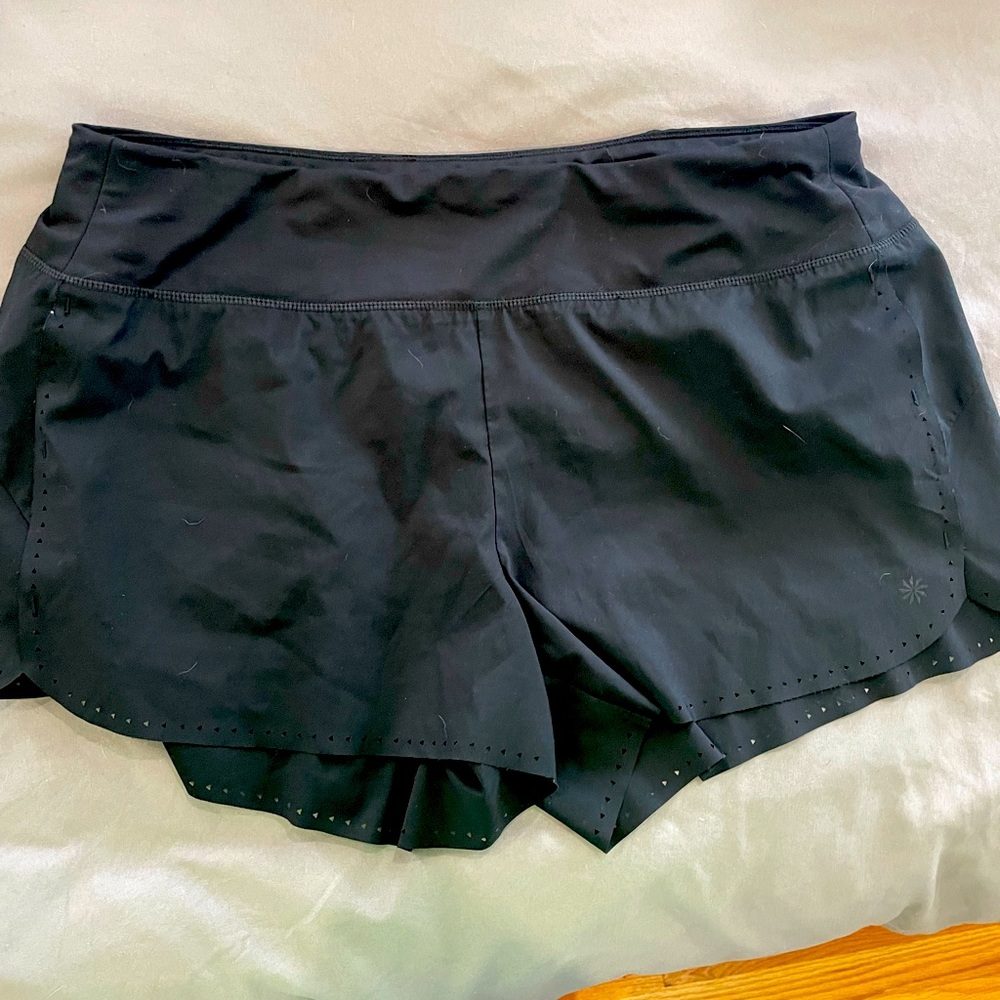 Size L athleta shorts never worn- too big for me